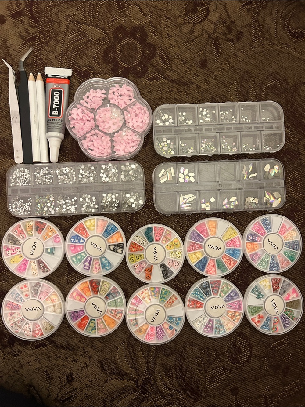 Nail art bows, gems,decorations, and chrome